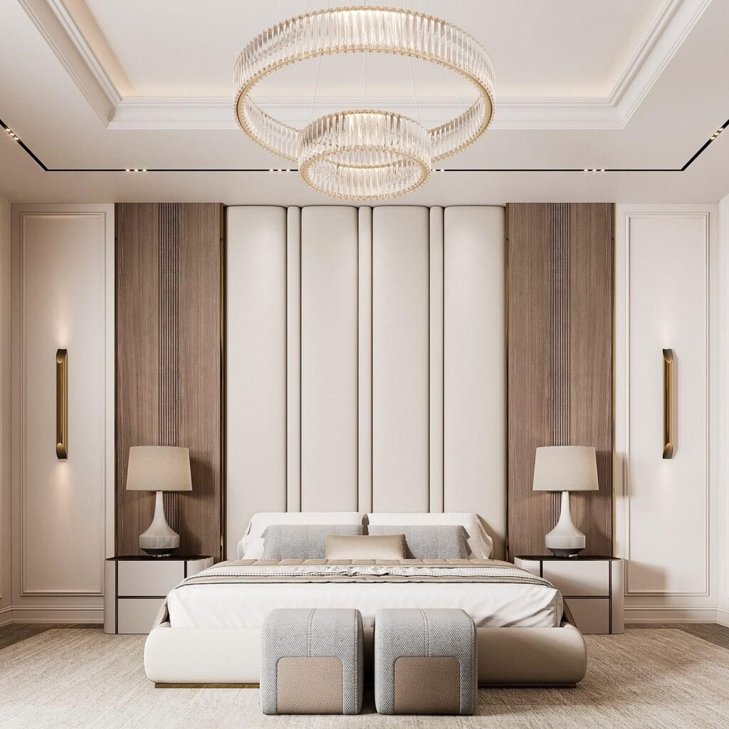 Sophisticated luxury bedroom with a statement chandelier above the bed.